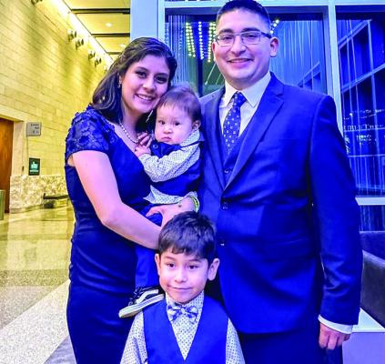 Dr. Cristian Medina with his wife, Diana, and sons Mikhail and Yeshua.