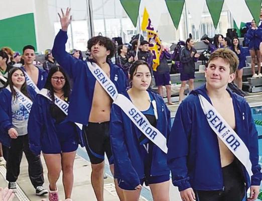 The Blue Wave swim team seniors are recognized at the district meet. Courtesy photo