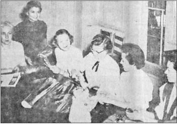 December 1957 … GILT AND GLITTER in the making for Holiday Hotel is being prepared here by the committee members of the Garden Club, from left, Jack Silliman, general chairman, Frank Warren Jr., club president; Miss Vera Thorman and Mmes. William Hoefs, Fred Chandler Jr. and Gene Riggs. Holiday Hotel is set for Saturday and Sunday at Riggs Museum.