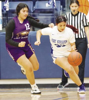 Diem Hinostroza (33) brings the ball up the court Friday in the junior varsity Prowlers 42-23 win over Pecos. Photo by Shawn Yorks