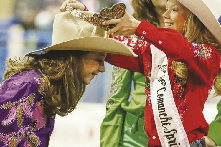 LEFT: Lane Evans of Goldthwaite, Texas competes in the bareback riding competition Saturday at the Comanche Springs Rodeo in Fort Stockton. RIGHT: Brooklyn Drewry is crowned 2024 Comanche Springs Rodeo Princess by 2023 Princess Sadie Woods during Saturday’s Comanche Springs Rodeo. See more photos on Page 10. Photos by Shawn Yorks