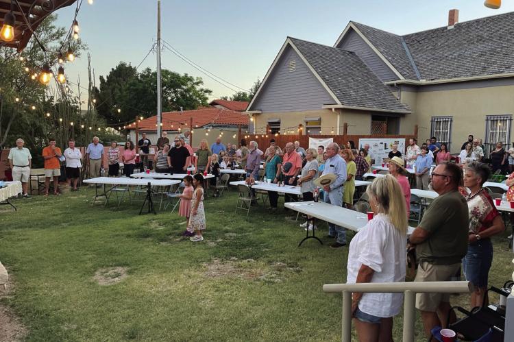 Last Thursday, the Annie Riggs Memorial Museum hosted another “Summer off the Patio” event for the community. Friends and families, pictured here singing the National Anthem, enjoyed the music of Kimmi Bitter. The next backyard-style concert will be on June 27 with Lee Mathis. Courtesy Photo
